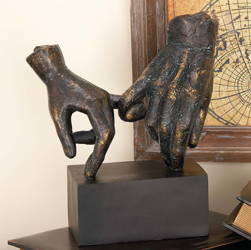 Polystone Weathered Patina Linked Hands Decorative Sculpture with Block Base and Gold Accents